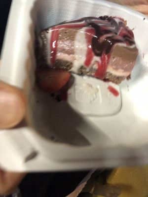 Raw cake: 
Chocolate, avocado, current, dates, cashew, Brazil nuts, coconut, monk fruit 

  at Caravan of Dreams in New York City