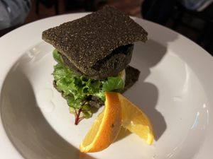 raw burger  at Caravan of Dreams in New York City