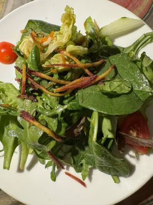 Side salad comes with entree  at Caravan of Dreams in New York City