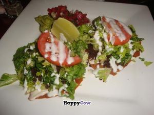 raw pizza at Caravan of Dreams in New York City