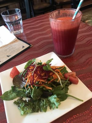 Complimentary starter salad and the Angel juice at Caravan of Dreams in New York City