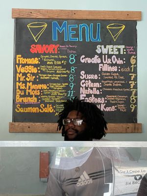 Menu on board at Give a Crepe in Erie