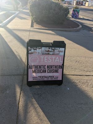Sign on curb at Testal Mexican Kitchen in Phoenix