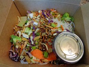 Sesame Salad. Romaine, broccoli slaw, rice noodles, almond + sesame chili crunch, creamy sesame vinaigrette  at Chardon Buckeye Chocolate Café in Chardon