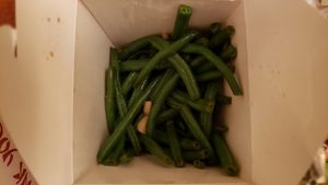 Sautéed green beans ($9.25). Low-grade, from frozen green beans that were chewy and bland. at Hunan Chinese Restaurant in La Crosse