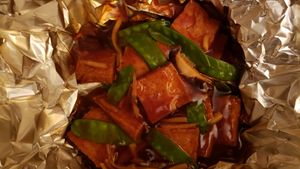 Beancurd with mushroom and bamboo ($10.75). Gloopy sauce, but savory and decent enough, I guess. at Hunan Chinese Restaurant in La Crosse