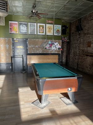 Pool table attached to pizza friend pizza and bar next door,  all same ownership  at Pizza Friendly Pizza in Chicago