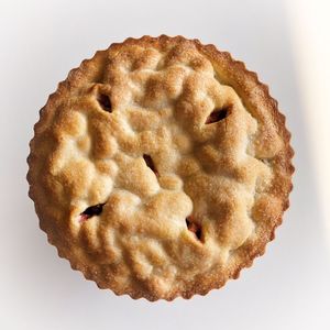 Rhubarb pie with strawberries and cream  at Baja Wegańska Cukiernia in Warsaw