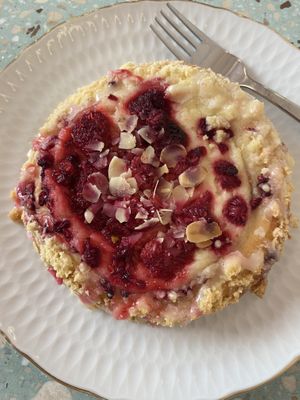 yeast cake with raspberries and cream  at Baja Wegańska Cukiernia in Warsaw