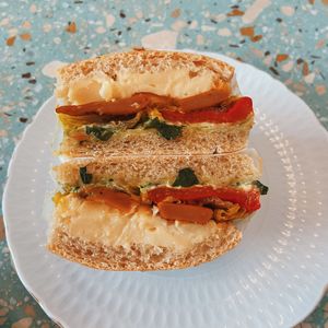 Tempeh sandwich with tofu cheese and peppers  at Baja Wegańska Cukiernia in Warsaw