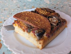 Pepperoni pizza slice at Baja Wegańska Cukiernia in Warsaw