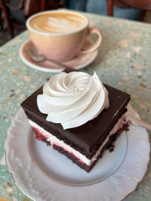 Warsaw cake (chocolate brownie with chocolate ganache, cherries, and whipped cream). at Baja Wegańska Cukiernia in Warsaw