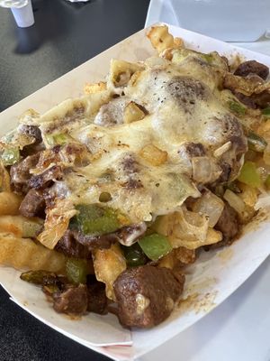 Loaded vegan fries with steak. Highly recommend.  at Black & Blue Diner in Las Vegas