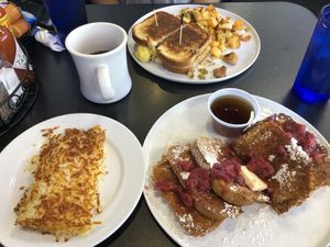 vegan French toast, hash browns, and vegan breakfast sandwich with potatoes  at Black & Blue Diner in Las Vegas