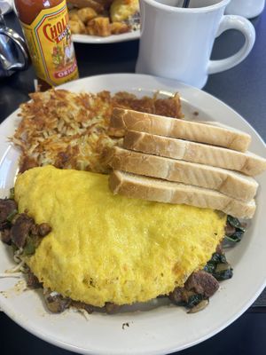Vegan steak omelette with hash browns and toast!  at Black & Blue Diner in Las Vegas