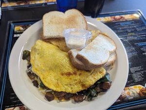 Vegan steak omelette. There's a nice helping of hash browns under the toast. at Black & Blue Diner in Las Vegas