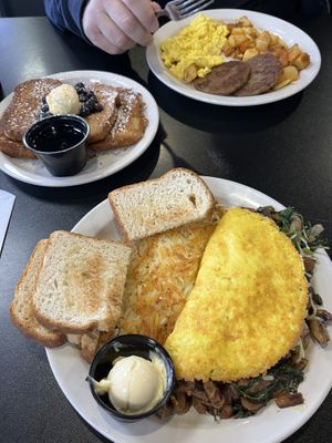 Breakfast with pancakes and sausage patties, and omelette with streak bits and hash browns   at Black & Blue Diner in Las Vegas