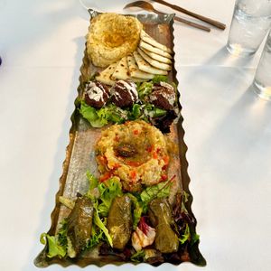 Tapas platter with hummus, falafel, baba ganoush, and grape leaves  at Red Onion Organic in Destin