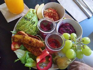 Vegan breakfast with tempeh, red beet spread, hummus, and extra avocado (not included) at Das Nest in Mainz