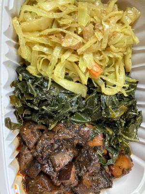 Regular 1 protein dish with 2 sides- mushrooms with cabbage and collards  at Greens N Teff in Arlington