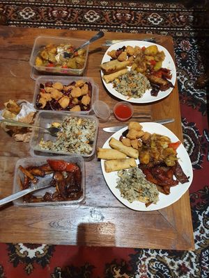 Take away at home. Veg spring rolls, ginger mock duck, Chinese olive fried rice,  spicy chicken,  three veg. at Happy Family Restaurant  in Tecoma