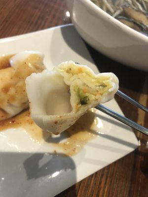 Baby dumpling with spicy sauce   at Franchia Vegan Cafe in New York City