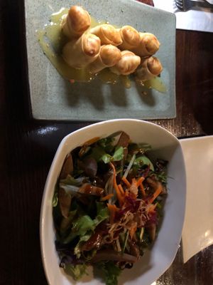 Duck salad with tasty tangy sauce and crispy spring rolls  at Franchia Vegan Cafe in New York City