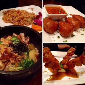 Delicious buffalo wings, "chicken" satay, "duck" stone bowl, and Malaysian rice! at Franchia Vegan Cafe in New York City