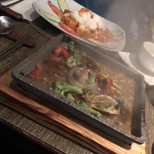 Shiitake mushrooms bulgogi! And some spicy buffalo tofu in the background!  at Franchia Vegan Cafe in New York City