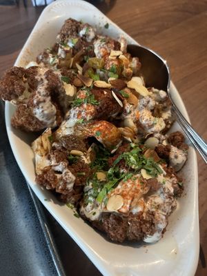 Cauliflower with Tahini and Golden Raisins  at Amar Mediterranean Bistro in Delray Beach