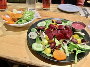 tickled pink beet salad no goat cheese + fresh veg plate w hummus!  at Alibi Ale Works in Incline Village