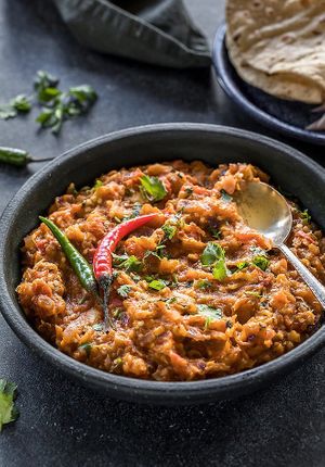 Baigan bharta a dish made with grilled eggplant chopped in Indian gravy. at Barbecue Palace Indian in Cuenca