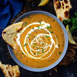 Daal makhani a Punjabi dish made using black lenteja and red beans served with naan bread / Rice. at Barbecue Palace Indian in Cuenca