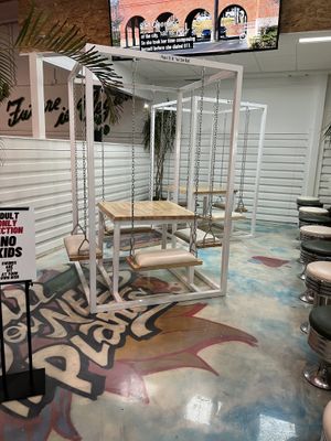 Swing area   at Plant Based Pizzeria in Sandy Springs