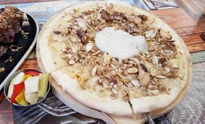 Cream cheese pizza with nuts at Think Vegan in Seoul