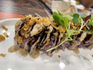 Kimchi roll. Rice, tofu & vegan fishball inside was mushy so the texture overall was unpleasant. Only thing I liked is Kimchi, crunch topping on top & the sauce on the bottom at Think Vegan in Seoul