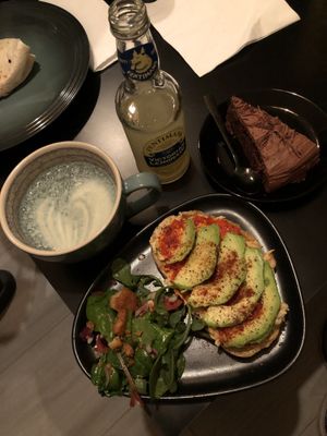 Toast with hummus and avjar, chocolate cake, green coffe at Maloca Coffee & Food in Bodo