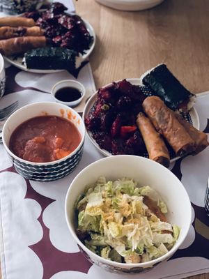 Chicken caesar salad, kaldereta, vegetable lumpia, musubi, tocino at Chef Reina in Brisbane