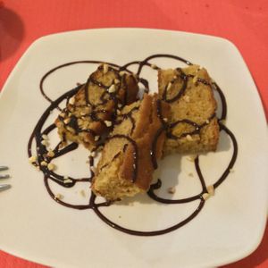 Orange cake 💚 at Loving Hut in Madrid