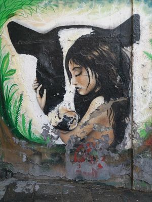 Beautiful mural outside at Loving Hut in Madrid