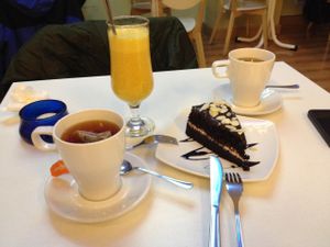Tea, Coffee and Vegan Chocolate Cake after a stroll in Madrid. at Loving Hut in Madrid