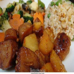 Pineapple Vegan 'Chicken' w/fried rice and veggies  at Loving Hut in Madrid