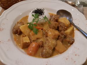 Menu of the day / weekends / dinner / main / seitan curry at Loving Hut in Madrid