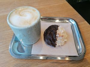 Cappuccino and koko macaron at Bakery Bakery - Länggasse in Bern
