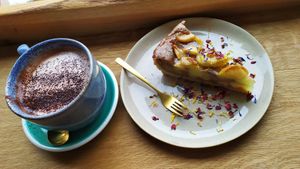 Hot chocolate with coconut milk, vegan cake at The Brother Mill in Munich