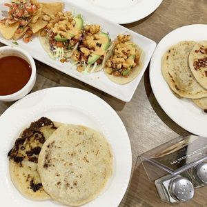 Vegan bean and cheese pupusas, Vegan chikn' tacos with almond chipotle sauce, and salsa at Tias in St George