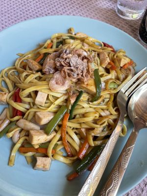 Stir fried noodles with curry  at Vegan Society in Chiang Mai
