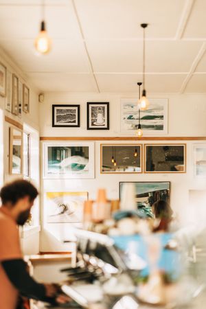 our inside space featuring local artworks at Zephyr Wainui in Gisborne