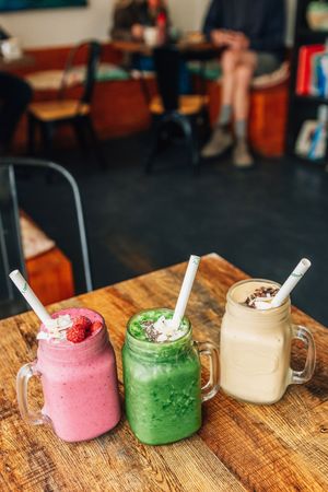 our three most popular superfood smoothies, the berry smoothie, the green smoothie and the coco espresso  at Zephyr Wainui in Gisborne