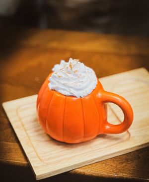 Pumpkin spice cream latte topped with vegan coconut whip at Variable cafe #Veganuary at Variable Cafe in Los Angeles